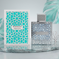 Frasco de perfume Rayhaan Aquática Original da Luxos do Oriente, líquido transparente em embalagem elegante com detalhes dourados.