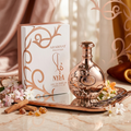 Perfume Nyla Arabiyat Prestige da Luxos do Oriente, frasco de Eau de Parfum com design elegante e detalhes dourados.
